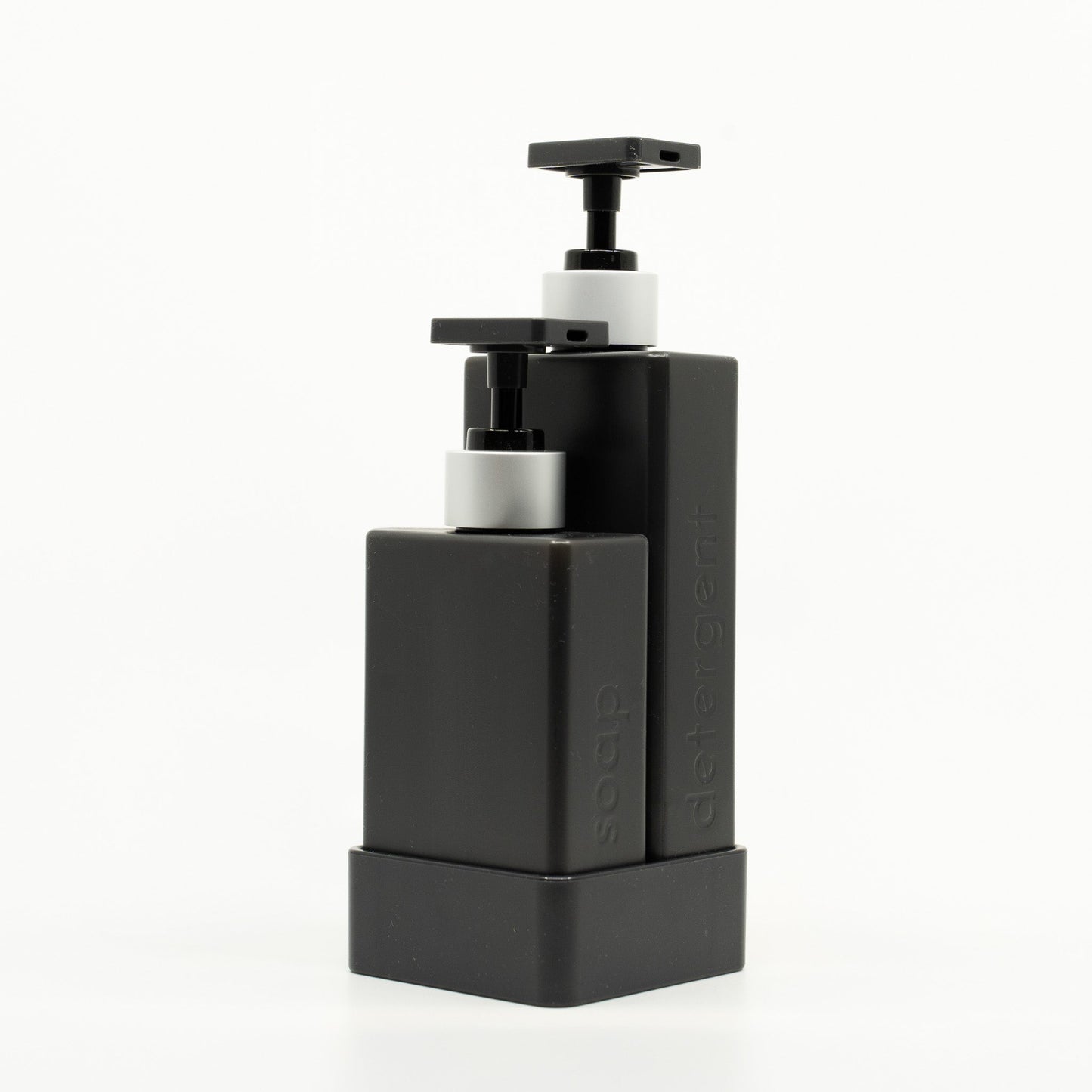 Black soap dispenser with pump on a white background