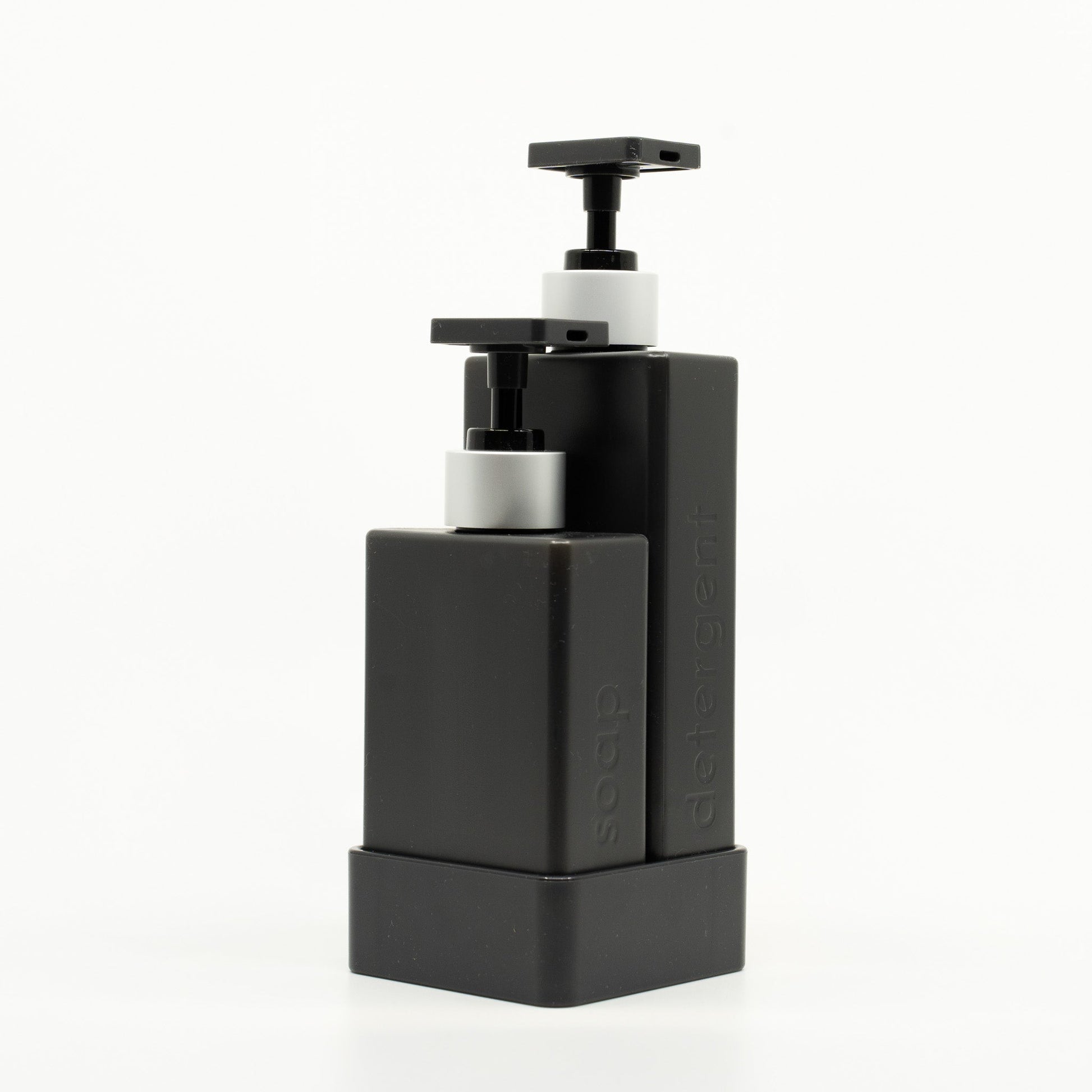 Black soap dispenser with pump on a white background